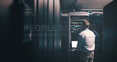 Buy stock photo Technician, back and laptop with man in server room for cybersecurity, network and system database. Software update, signal transmission and cloud computing with person in data center for maintenance