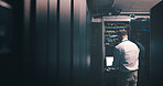 Engineer, technician and laptop with man in server room for hosting database, inspection and cybersecurity. Hardware storage, cloud computing and system backup with mature person in data center