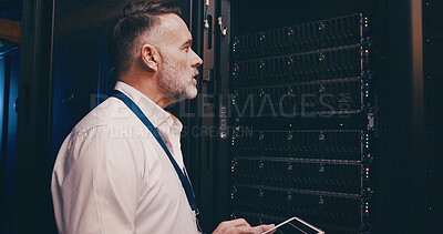 Buy stock photo Maintenance, technician and tablet with man in server room for hosting database, inspection and cybersecurity. Hardware storage, cloud computing and system backup with mature person in data center