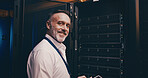 Smile, portrait and cybersecurity with man in server room for data center, network or systems. It technician, software database and cloud computing with mature person for hardware maintenance