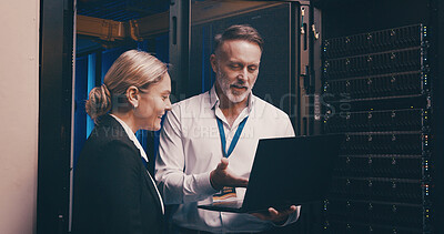 Buy stock photo Laptop, talking and team of engineers in server room for technical support, database or cybersecurity. Computer, collaboration and people with system upgrade in data center for network programming.