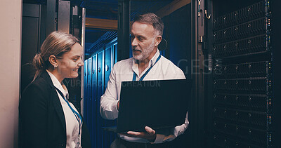 Buy stock photo Server room, meeting and people on laptop for network maintenance, IT support and database. Cybersecurity, technician team and man with woman on computer for diagnostics, system update and hardware
