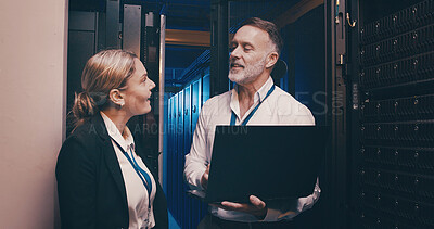 Buy stock photo Server room, talking and people on laptop for database, network maintenance and IT support. Cybersecurity, technician team and man with woman on computer for diagnostics, system update and backup