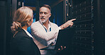 Laptop, pointing and team of engineers in server room for technical support, database or cybersecurity. Computer, teamwork and people with system upgrade in data center for network programming.
