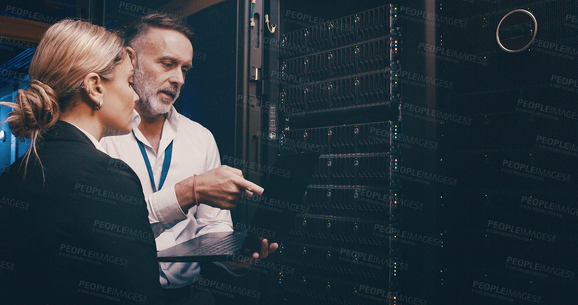 Buy stock photo Cybersecurity, laptop and upgrade with people in server room together for network administration. Collaboration, computer and storage with tech support team in data center for firewall installation