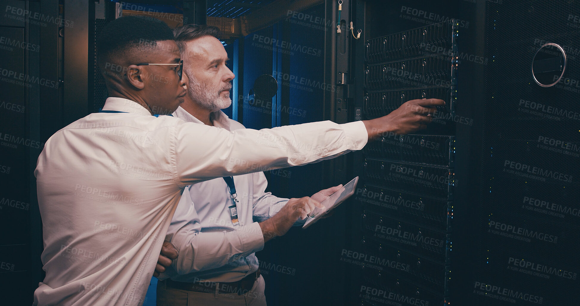 Buy stock photo Men, tablet and inspection in server room with maintenance, review and point with mentor for system upgrade. People, tech and assessment with app, solution and programming with cybersecurity team