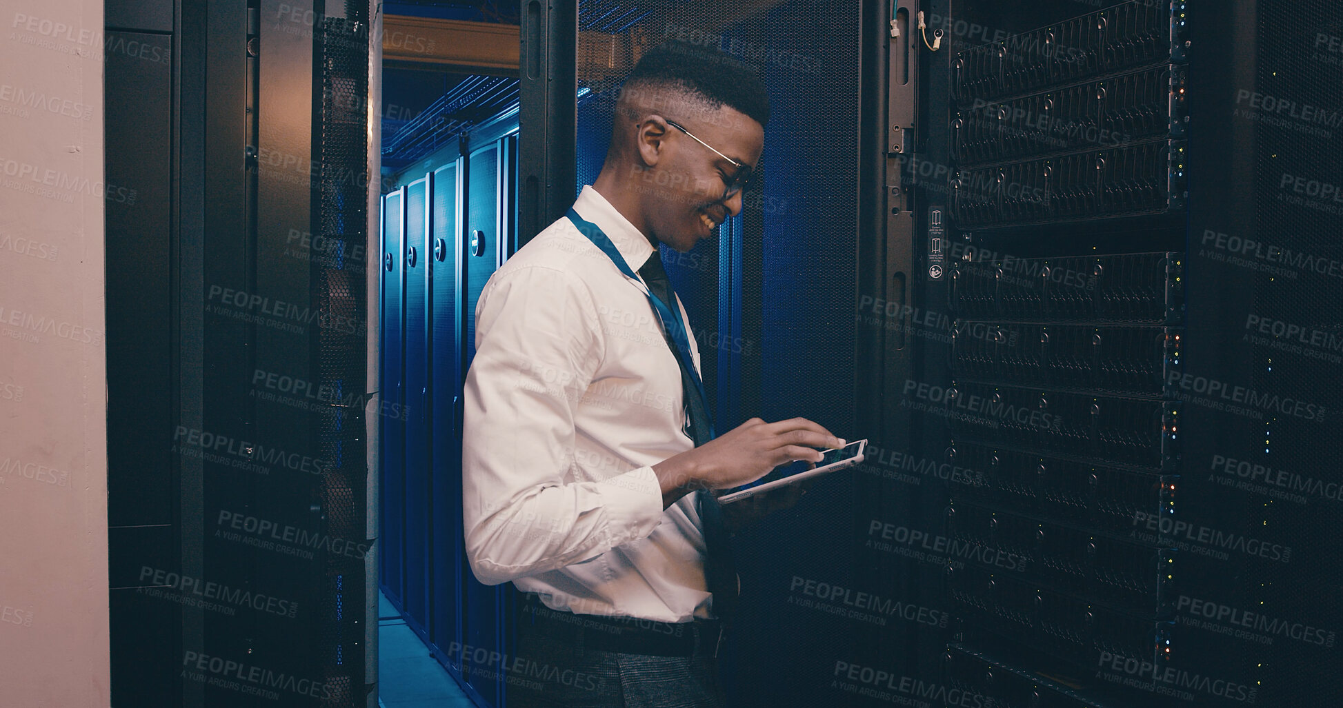 Buy stock photo Coding, engineer and man with tablet, server room and happy for network engineering and programming. Data center, IT specialist and black person with smile for information technology and maintenance
