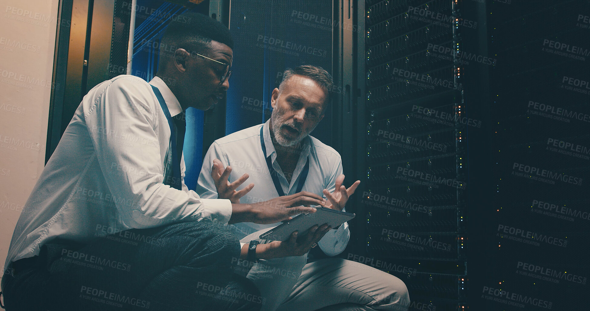 Buy stock photo People, explain and network with tablet in server room for programming, software update and maintenance. Men, team and digital for database upgrade, IT inspection and system fail for technical repair