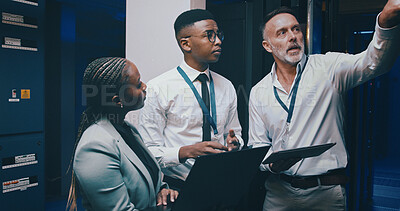 Buy stock photo Talking, network and business people with tech in server room for cybersecurity, diagnostics IT support. Team, meeting and workers on laptop, tablet and hardware for system update, database or backup
