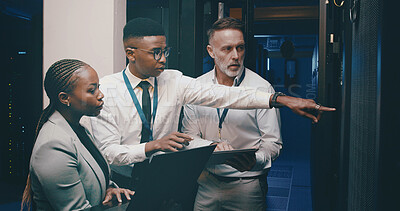 Buy stock photo Cybersecurity, laptop and pointing with people in server room together for network upgrade. Collaboration, computer and maintenance with tech support team in data center for administration backup