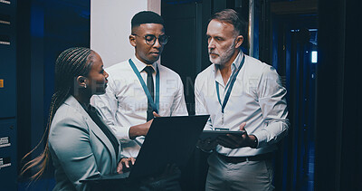 Buy stock photo Man, laptop and team with solution in server room with cybersecurity, system or collaboration. Programmer, tech and group with insight for problem solving, assessment or IT maintenance at data center