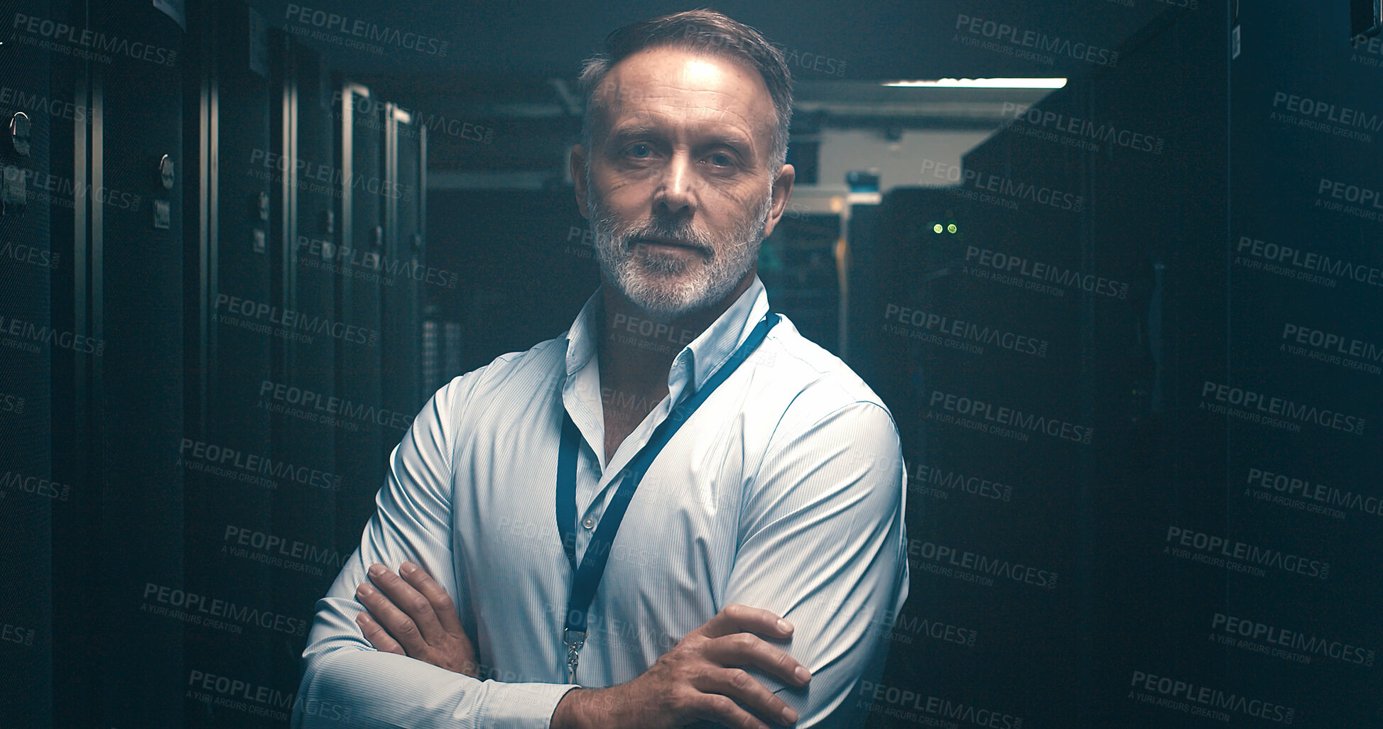 Buy stock photo Arms crossed, cybersecurity and portrait of man in server room for network administration. Cloud computing, mainframe and system with mature tech support employee in data center for maintenance