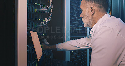 Buy stock photo Cable, laptop and technician man in server room for cyber security, software update and database system. Programmer, developer and cybersecurity with mature person in data center as engineer