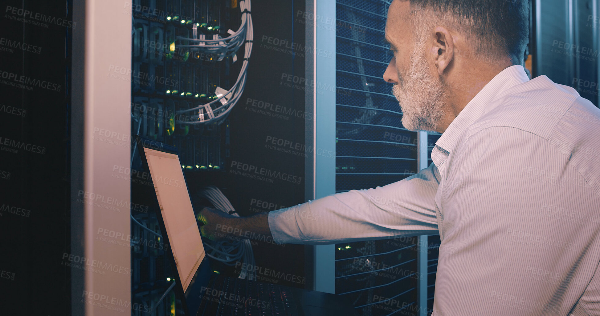 Buy stock photo Cable, laptop and technician man in server room for cyber security, software update and database system. Programmer, developer and cybersecurity with mature person in data center as engineer
