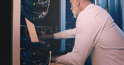 Buy stock photo Technician, cable and laptop with man in server room for cybersecurity, network and system database. Software update, signal transmission and cloud computing with mature person in data center