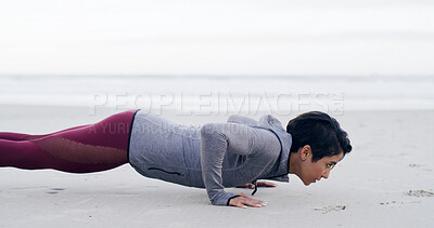 Buy stock photo Athlete, woman and pushup for fitness at ocean for exercise, strength training and strong muscles. Female person, weight and workout routine, body balance and sports performance for wellness at beach