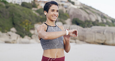 Buy stock photo Fitness music, thinking and woman with smart watch at beach for heart rate or exercise progress. Earphones, happy runner or check wristwatch for wellness stats, timer or pace tracking with reflection