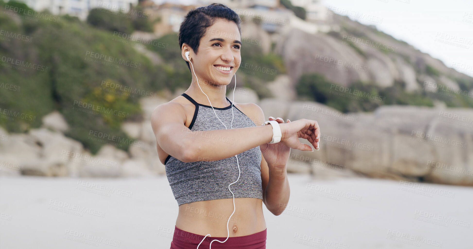 Buy stock photo Fitness music, thinking and woman with smart watch at beach for heart rate or exercise progress. Earphones, happy runner or check wristwatch for wellness stats, timer or pace tracking with reflection