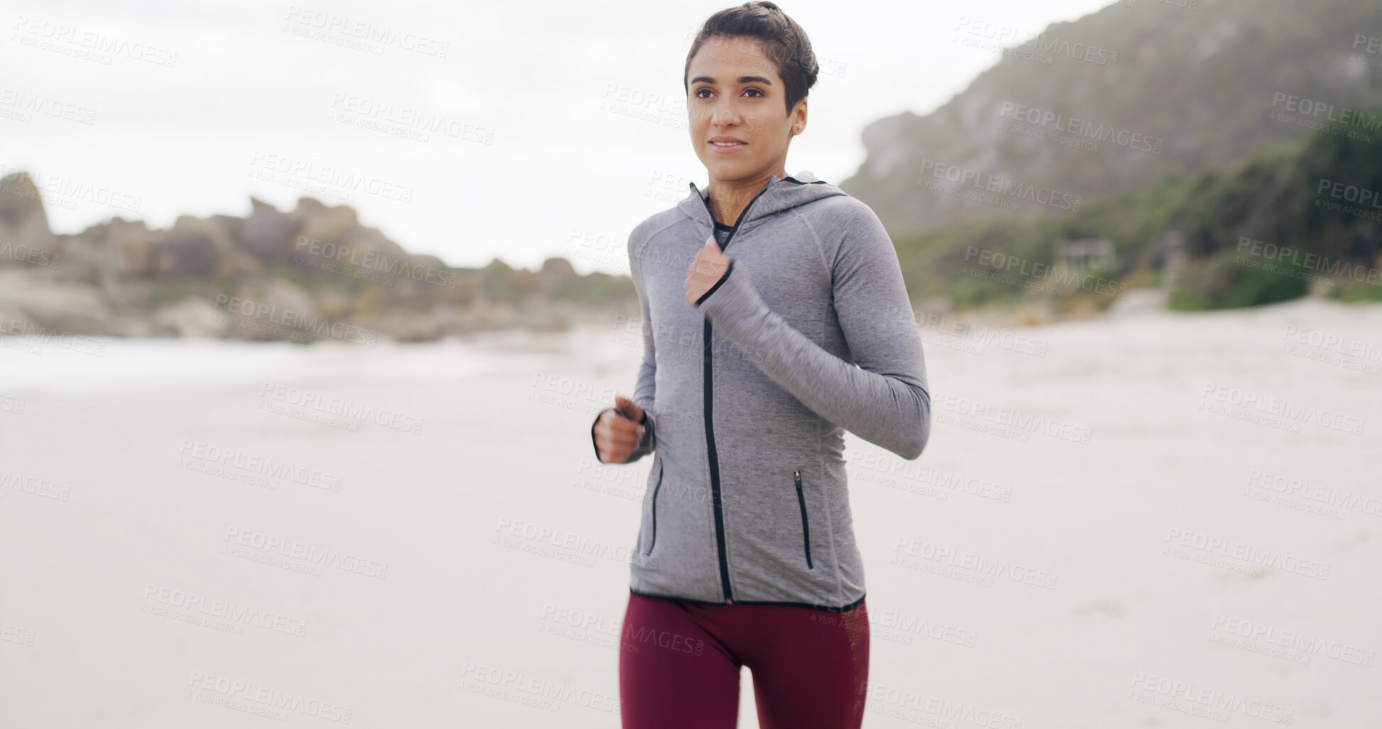 Buy stock photo Running, health and fitness with woman at beach for sprint, cardio workout and sports training. Marathon practice, exercise and runner challenge with person outdoor for energy, athlete and wellness