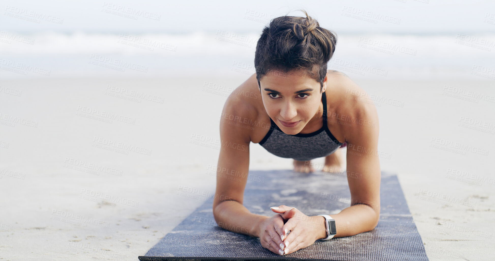 Buy stock photo Woman, plank and exercise at beach, smile and challenge with strong core development in nature. Girl, workout and outdoor for training, fitness and muscle with space on ground by ocean in New Zealand