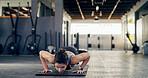 Push up, fitness and exercise with woman in gym for workout, core strength and health. Bodybuilder, challenge and abs training with person on floor of sports club for athlete, muscle and wellness
