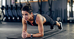 Plank, fitness and workout with woman in gym for exercise, core strength and health. Bodybuilder, challenge and abs training with person on floor of sports club for athlete, muscle and wellness