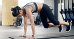Mountain climbers, health and fitness with woman in gym for abs workout, muscle and exercise. Wellness, bodybuilder and core strength with person in sports club for oblique training and challenge