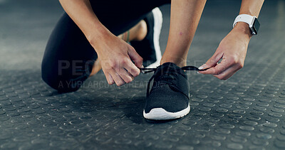 Buy stock photo Fitness, tie shoes and hands of woman in gym for workout, start exercise and health. Sneakers, athlete and wellness with closeup of female person in sports club for training and cardio challenge