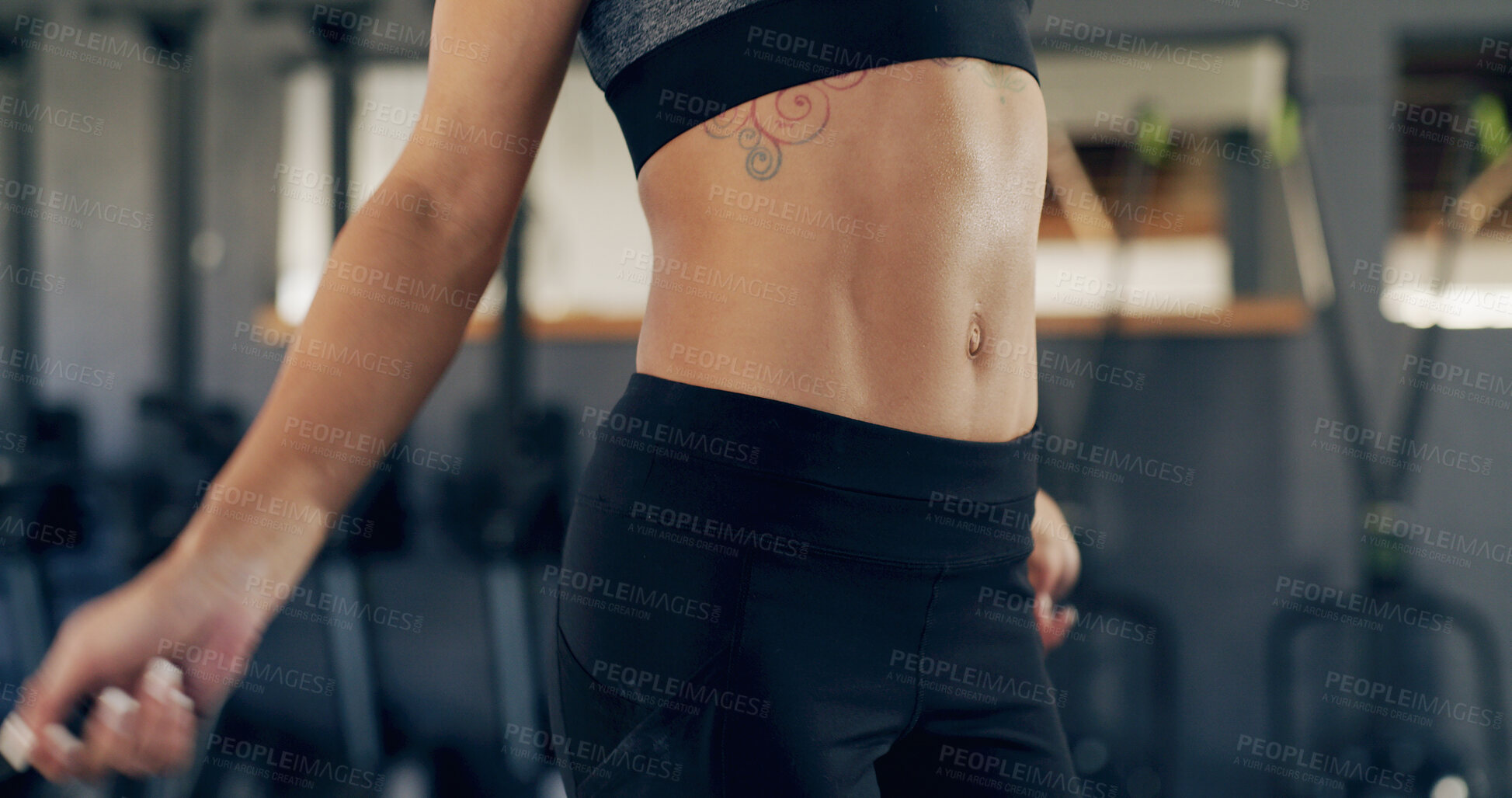 Buy stock photo Abs, person and skipping with rope gym for fitness, exercise routine and cardio training. Athlete, woman and jump with equipment for endurance, physical workout and sports performance for wellness