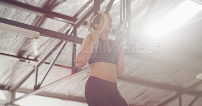 Buy stock photo Athlete, woman and gymnastic rings for fitness with exercise, stability training and core workout. Female person, equipment and club for sports practice, strong muscles and body balance for challenge