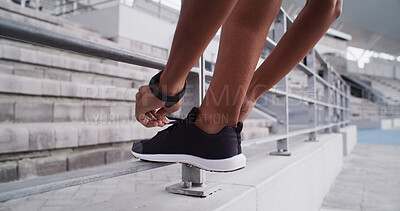 Buy stock photo Sneakers, laces and person hands on stadium, prepare for run or sports for workout on race track. Fitness, athlete or sprinter legs at arena for practice, training and start cardio exercise outdoor