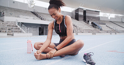 Buy stock photo Exercise, foot pain and inflammation with woman in stadium for accident or physical emergency. Fitness, injury and  massage with athlete or runner on track at venue for fatigue or muscle cramp