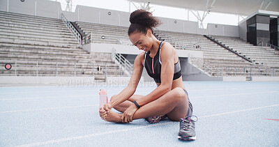 Buy stock photo Exercise, foot injury and inflammation with woman in stadium for accident or physical emergency. Fitness, massage and pain with athlete or runner on track at venue for fatigue or muscle cramp