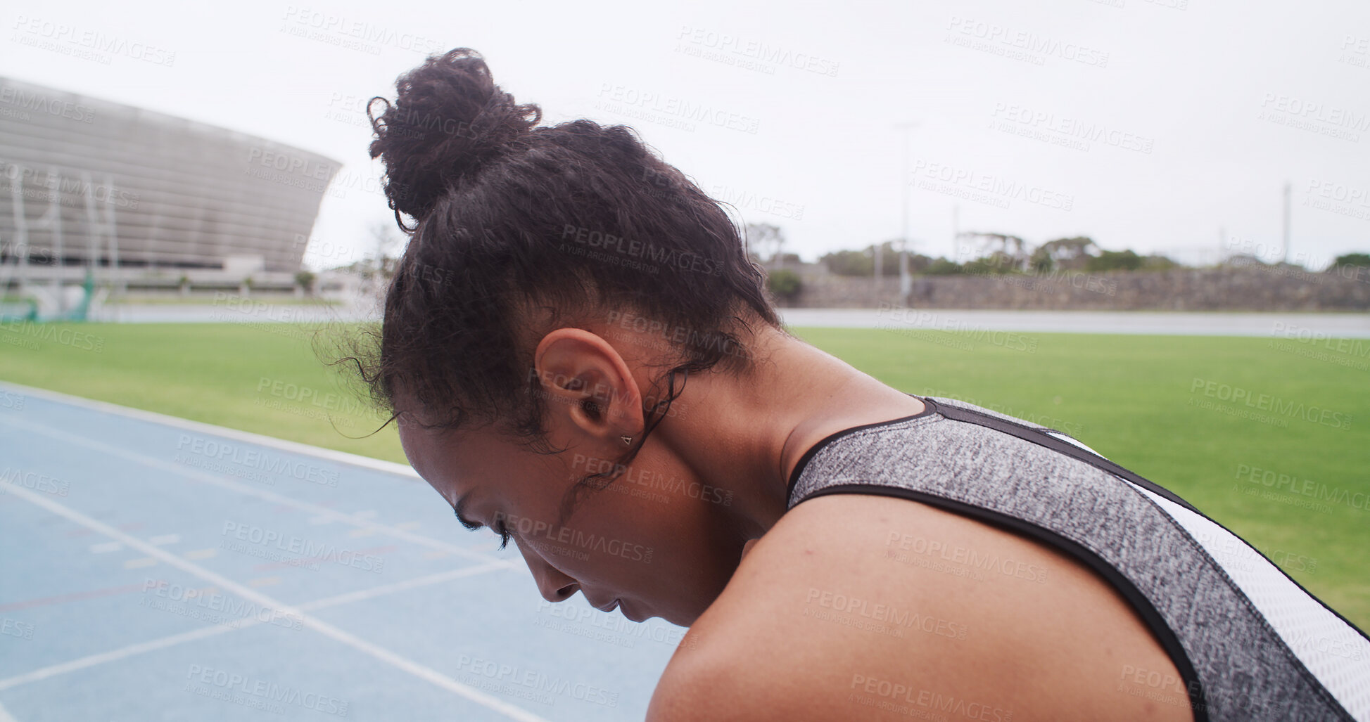 Buy stock photo Breathing, fatigue and fitness with woman in stadium for challenge, training or workout recovery. Break, exercise and exhausted with athlete or runner in sports venue for marathon or race preparation