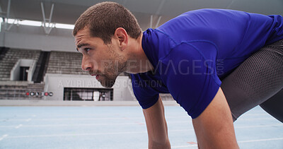 Buy stock photo Man, runner and preparation with start line on stadium track for sprint, race or training lap. Active, male person or athlete getting ready to begin for sport competition, distance running or fitness