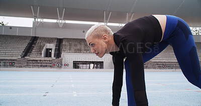 Buy stock photo Starting line, race track and woman in stadium for running, practice or training for competition. Fitness, runner and athlete getting ready for cardio workout, exercise or challenge at sports arena.