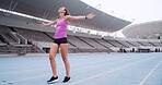 Excited, runner and woman at stadium, celebration or cheering for complete fitness goal and success. Outdoor, athlete and person with smile for achievement, training or exercise for marathon or sport