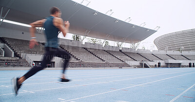 Buy stock photo Man, athlete and sprint at track, stadium and practice for competition with motion blur, speed or exercise. Person, runner and outdoor at arena for training, workout and fitness at sports club