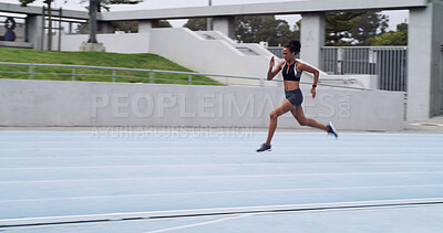 Buy stock photo Athlete, runner and woman on track with speed for fitness, training and cardio performance. Sprinter, motion or fast female person with race running at stadium for sports, practice and exercise