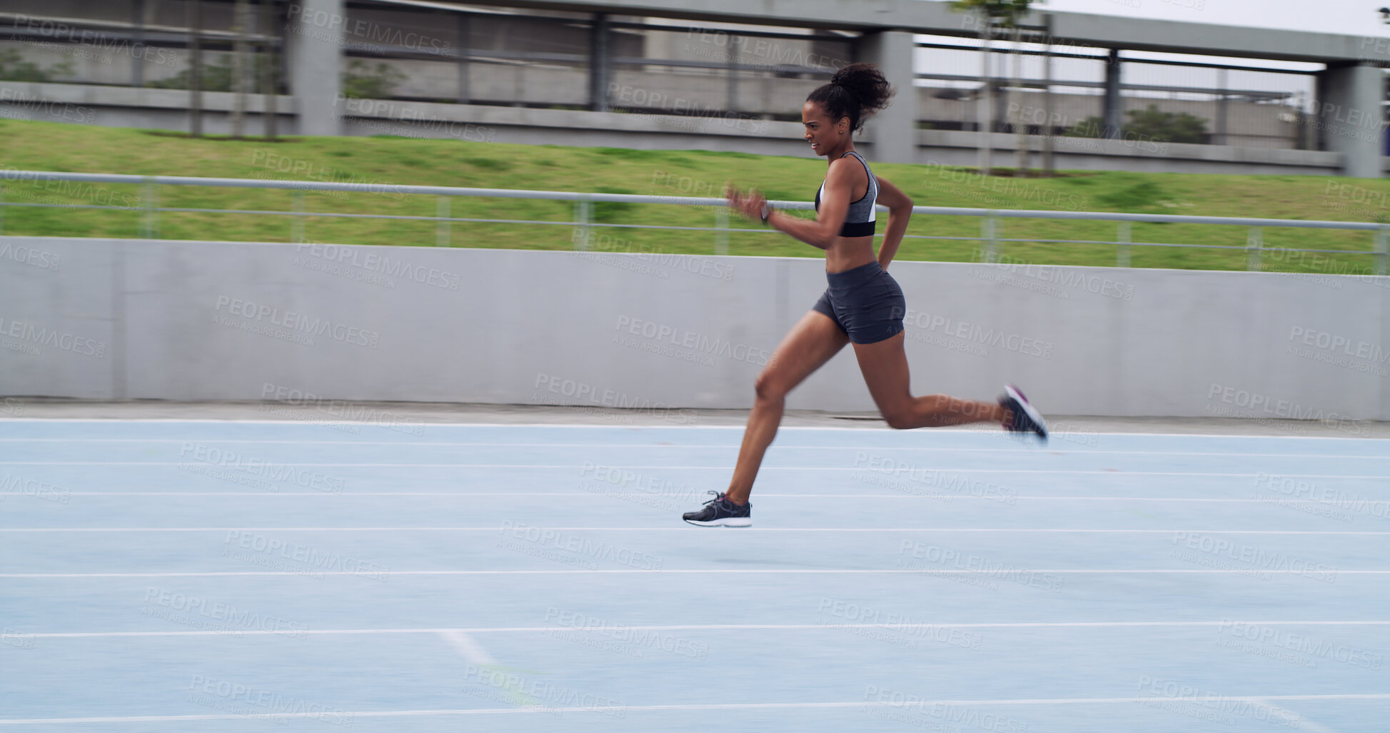 Buy stock photo Running, speed and training with woman on race track for cardio challenge, health or competition. Workout, fitness and sports athlete with person in stadium for exercise, marathon practice and sprint