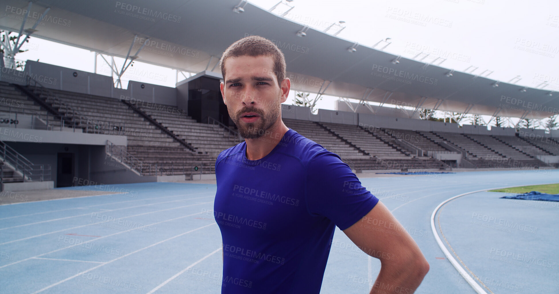 Buy stock photo Runner, portrait and fitness with man on race track for athlete, marathon practice and workout. Cardio challenge, exercise and running competition with person in sports stadium for training and event