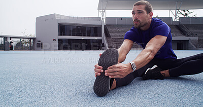 Buy stock photo Athlete, man and stretching legs at stadium for fitness, exercise and getting ready for marathon. Thinking, male person and warm up for training, runner workout and prepare for sports competition