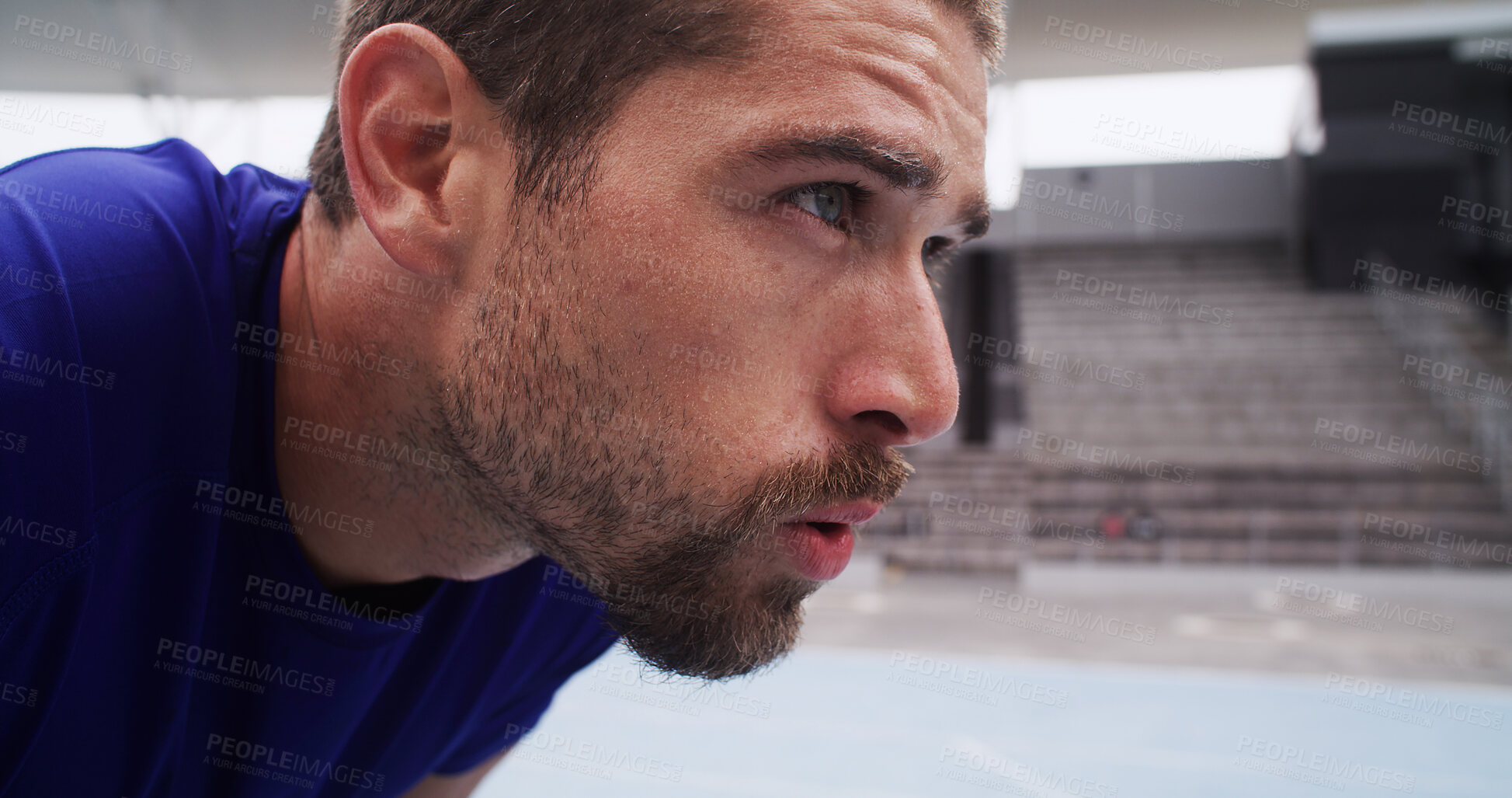 Buy stock photo Fitness, man and exhausted with breathing at stadium for fatigue, race break or competition with burnout. Athlete, profile and runner training for marathon, endurance challenge or tired for recovery