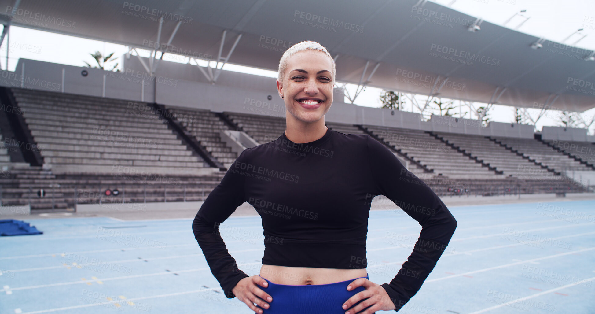 Buy stock photo Athlete, portrait and woman on sports track for training break, workout and wellness with a smile. Happy, female runner and confident at stadium for exercise, health and outdoor for fitness challenge