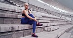 Exercise, portrait and smile of woman on stadium bleachers for fitness, training or workout as athlete. Break, competition and sports with happy runner at arena or venue for event or tournament