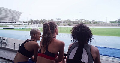 Buy stock photo Athlete, people and talk for rest at stadium for planning, fitness break and competition advice. Back, women and friends discussion for exercise, training tips and race feedback of sports tournament