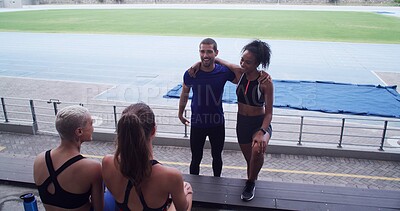 Buy stock photo Couple of friends, athlete and people at stadium for sports break, talking and fitness at training. Happy, communication and runner group relax together for rest, wellness and exercise outdoor