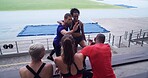 Fitness, high five and hug with people in stadium together for achievement or celebration of goals. Exercise, health and success with group of athlete friends embracing in arena for training target