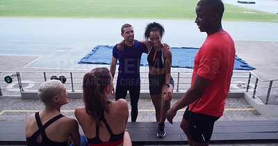 Buy stock photo Couple of friends, athlete and people talking at stadium for sports break, laugh and fitness at training. Happy, funny chat and runner group relax together for rest, wellness and exercise outdoor