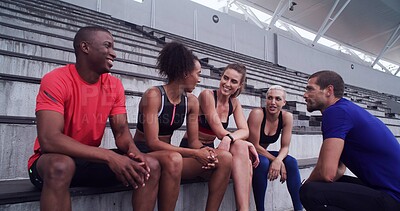 Buy stock photo Conversation, break and exercise with friends on stadium bleachers for bonding or sports training. Fitness, recovery and rest with group of athlete people speaking in venue for workout discussion